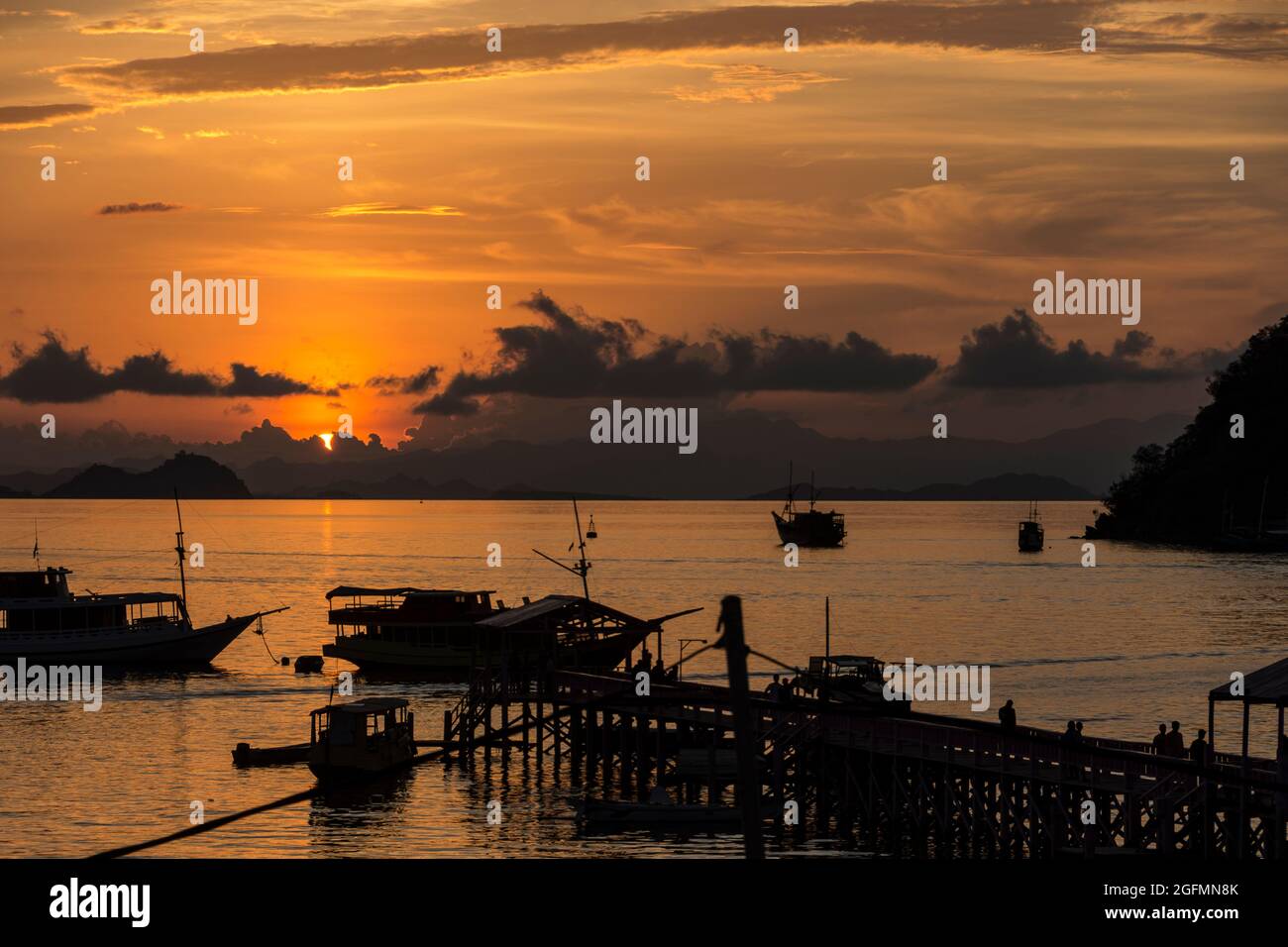 Harbor of Labuan Bajo at sunset. Flores, Indonesia Stock Photo - Alamy