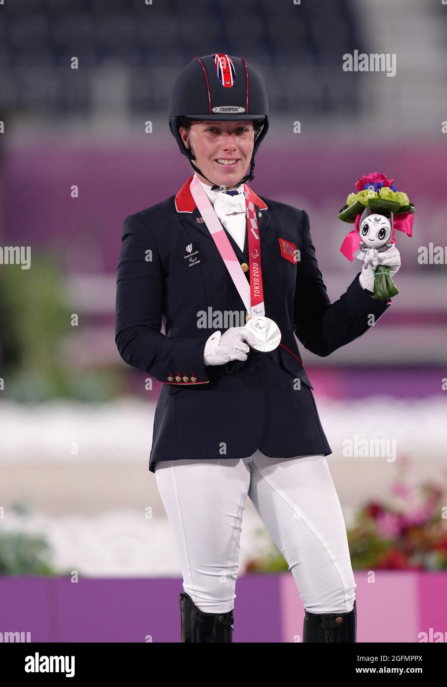 Great Britain's Sophie Wells with the silver medal after the Dressage ...