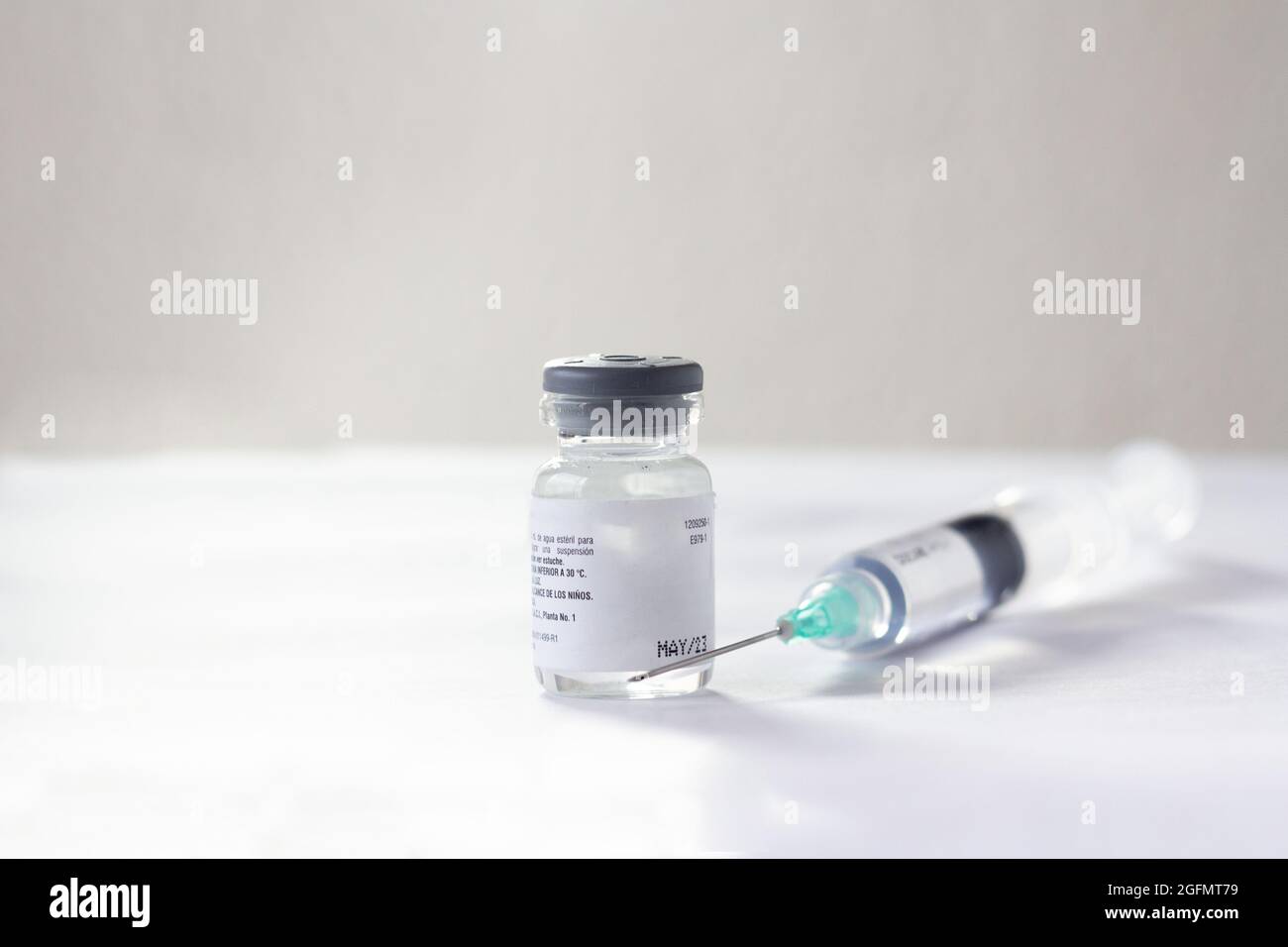Vials of vaccine and syringe Stock Photo