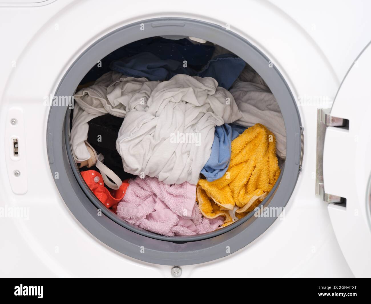 Laundry inside a washing machine. Close up Stock Photo Alamy