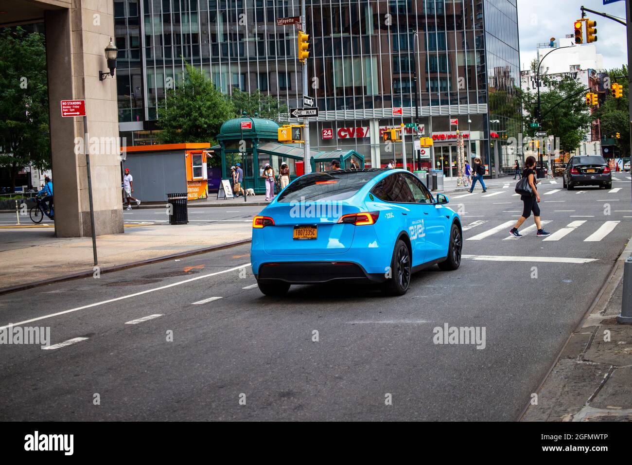 New York, NY, USA. 20th Aug, 2021. Revel Tesla taxi at Astor Place 