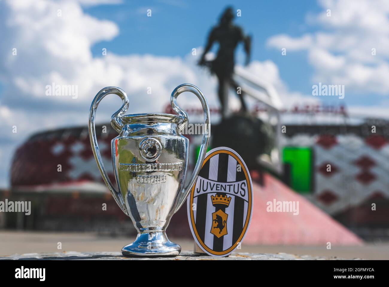 June 14, 2021 Turin, Italy. Juventus F.C. football club emblem and the UEFA Champions  League Cup against the backdrop of a modern stadium Stock Photo - Alamy