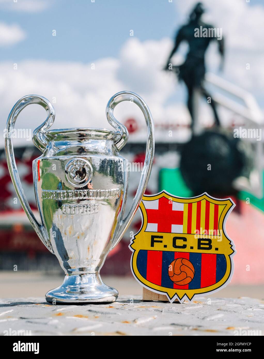 June 14 21 Barcelona Spain The Fc Barcelona Emblem And The Uefa Champions League Cup Against The Backdrop Of A Modern Stadium Stock Photo Alamy