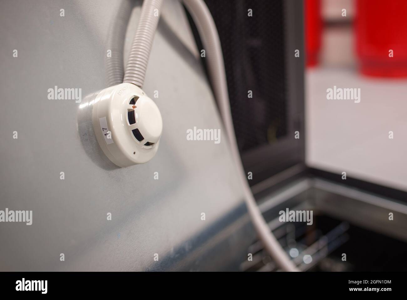 Smoke and fire detector built into the floor connected to clean agent