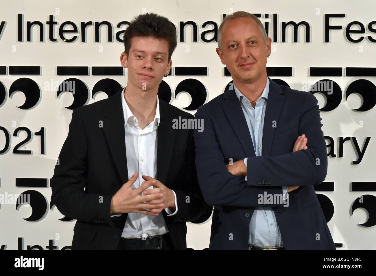 Karlovy Vary, Czech Republic. 26th Aug, 2021. Actor Leon de La Vallee, left, and director Claudio Cupellini, rigth, attended presentation of the film The Land of the Sons at the 55th Karlovy Vary International Film Festival (KVIFF), on August 26, 2021, in Karlovy Vary, Czech Republic. Credit: Slavomir Kubes/CTK Photo/Alamy Live News Stock Photo