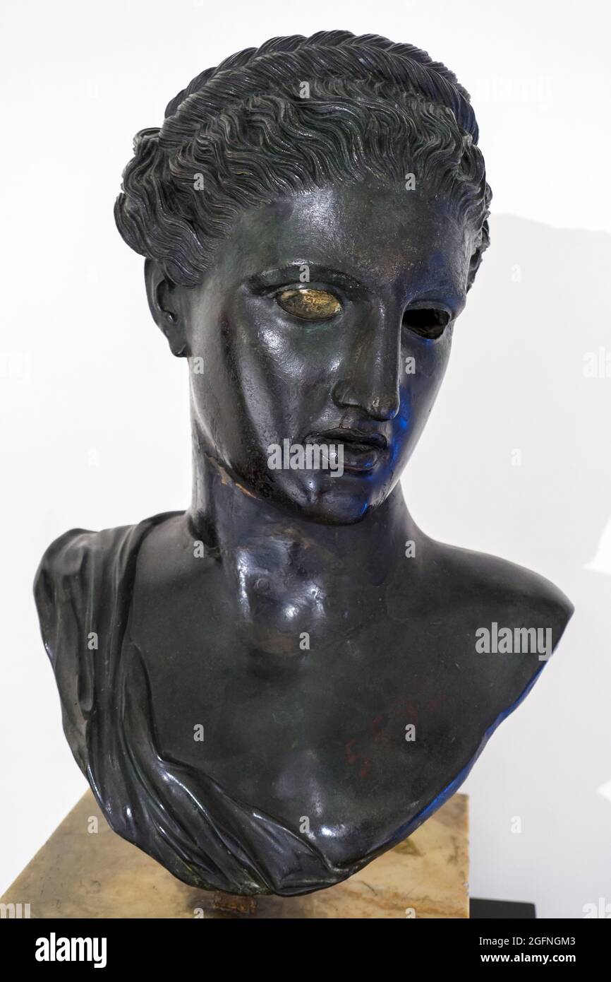 Bronze bust of Berenice / Artemis (the Greek goddess of the hunt, the wilderness, wild animals, the Moon, and chastity. The goddess Diana is her Roman equivalent) Herculaneum, Villa of the Papyri 1st century BC Stock Photo