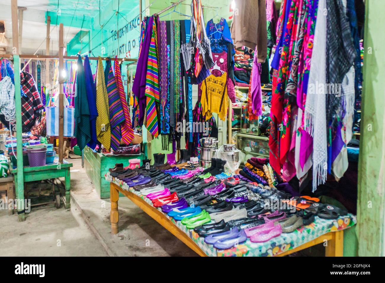 SAN MATEO IXTATAN, GUATEMALA, MARCH 19, 2016: Clothes stall on a market in San Mateo Ixtatan village. Stock Photo