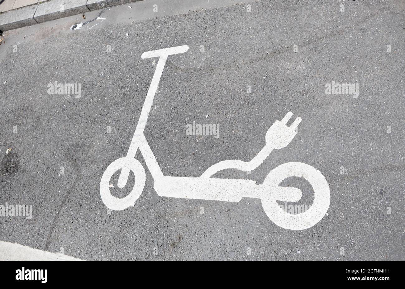 Parking area on the street for E-Scooters found in Munich, Germany. Stock Photo