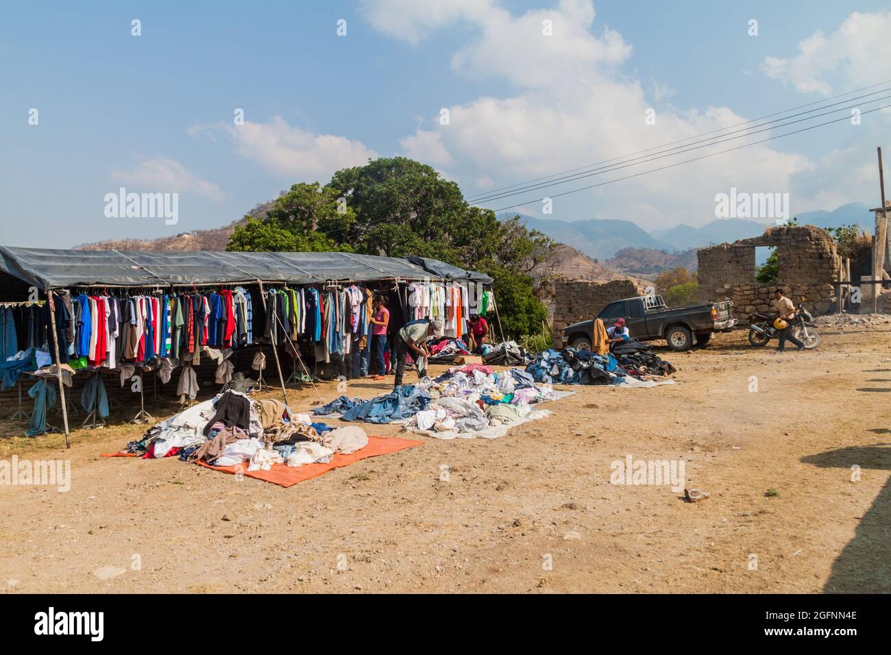 SAN MANUEL DE COLOHETE, HONDURAS - APRIL 15, 2016: Clothing market stall. There is a big market in this village twice a month. Stock Photo