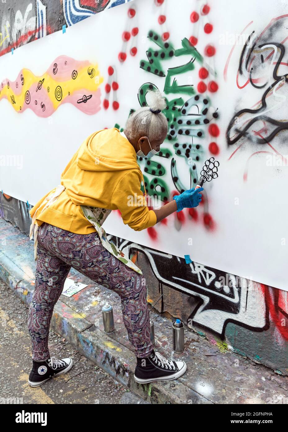 Artists Painting In The Waterloo Graffiti Tunnel London UK Stock Photo