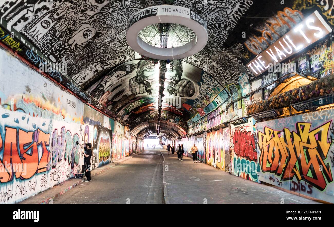 Artists Painting In The Waterloo Graffiti Tunnel London UK Stock Photo