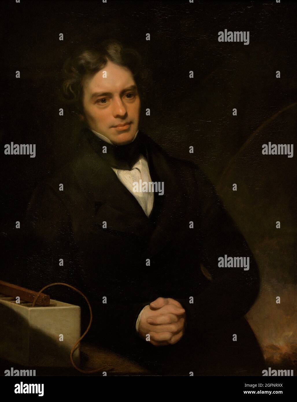 Michael Faraday (1791-1867). British physicist and chemist. Discoverer of electro-magnetic induction and electrolysis. Portrait by Thomas Phillips (1770-1845). Oil on canvas (90,8 x 71,1 cm), 1841-1842. National Portrait Gallery. London, England, United Kingdom. Stock Photo
