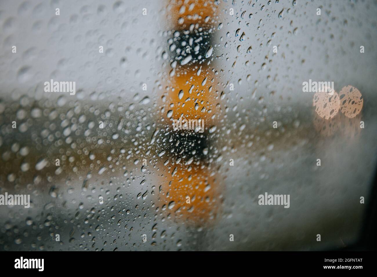 Closeup of raindrops on a car window Stock Photo - Alamy