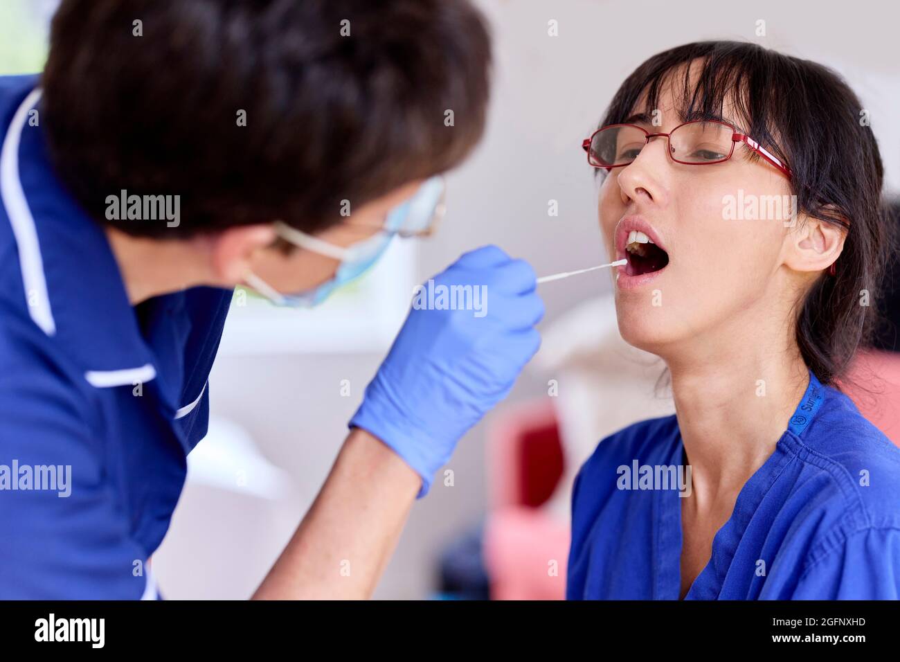 Nurse PCR testing Stock Photo