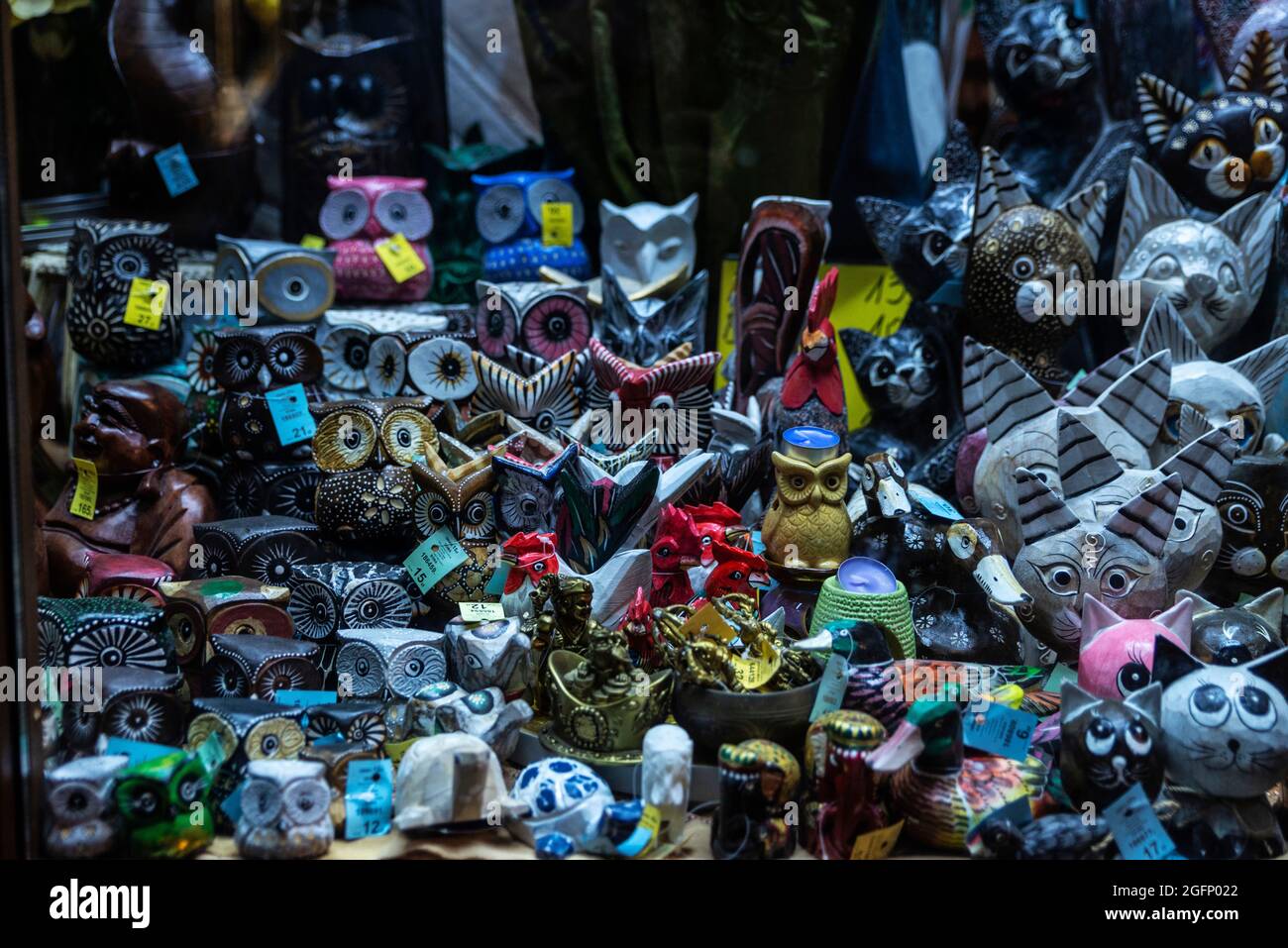 Krakow, Poland - August 29, 2018: Display of a Original polish pottery shop with figures of cats and owls at night in the Slawkowska Street, shopping Stock Photo