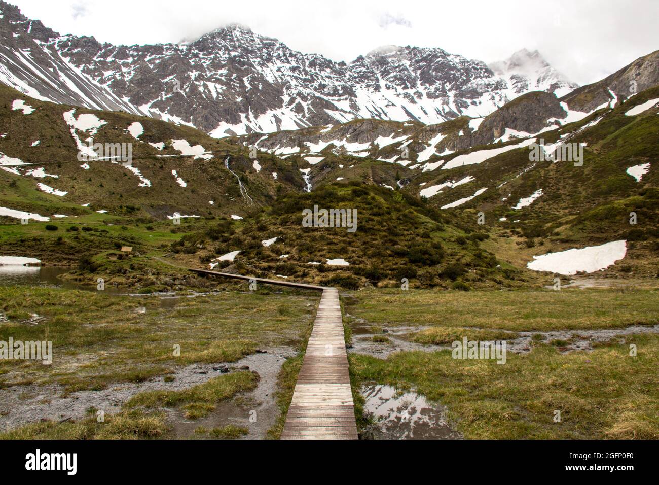 Wooden Path in the Mountains Stock Photo