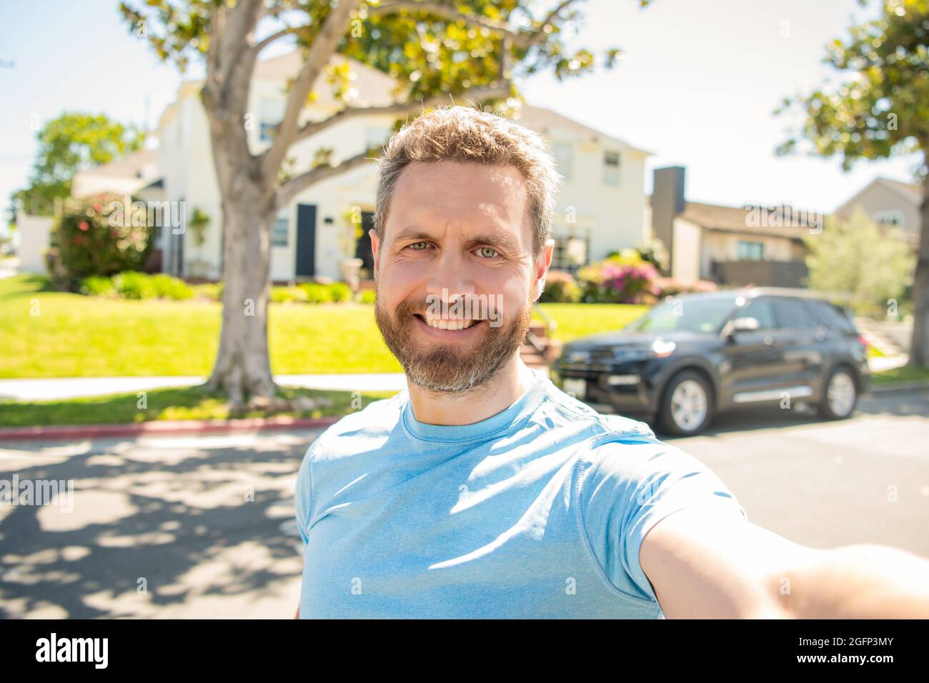 selfie. express positive emotions. happy man with beard making selfie photo. male face portrait Stock Photo