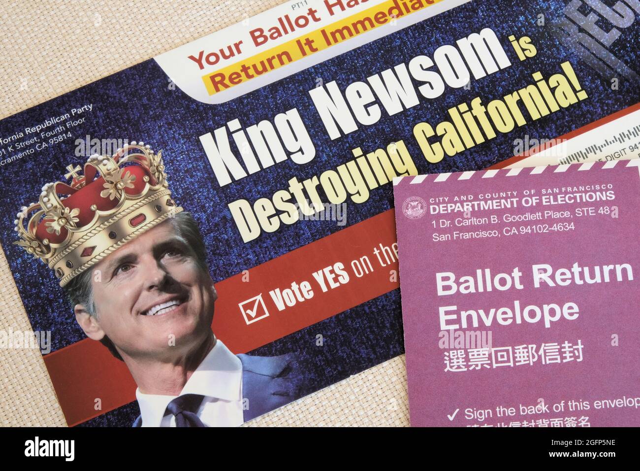 Ballot Return Envelope and publicity critical of and against Governor Newsom for September14 2021 California Gubernatorial Recall Election. Stock Photo