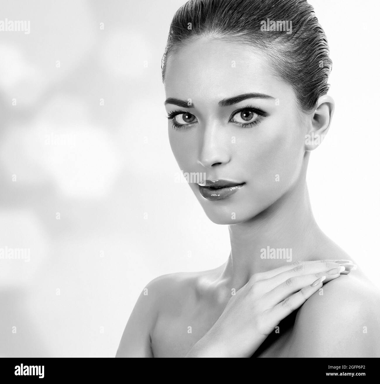 Pretty woman against an abstract background with circles and copyspace Stock Photo