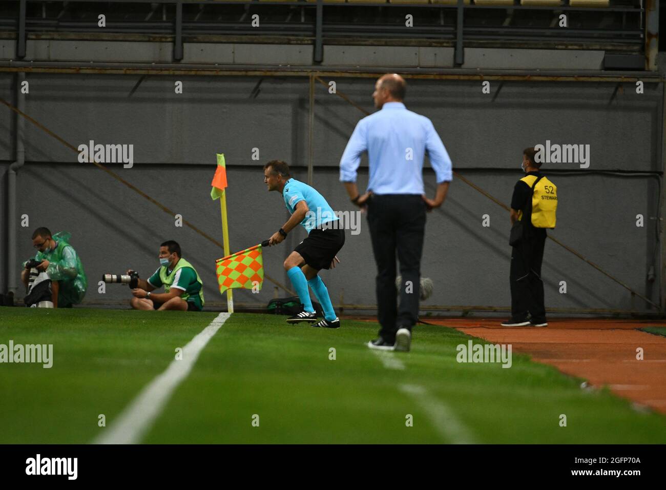 ZAPORIZHZHIA, UKRAINE - AUGUST 26, 2021 - An assistant referee is seen on the sideline during the 2021/2022 UEFA Europa League play-off 2nd leg game between FC Zorya Luhansk and SK Rapid Wien at the Slavutych Arena, Zaporizhzhia, southeastern Ukraine. Stock Photo
