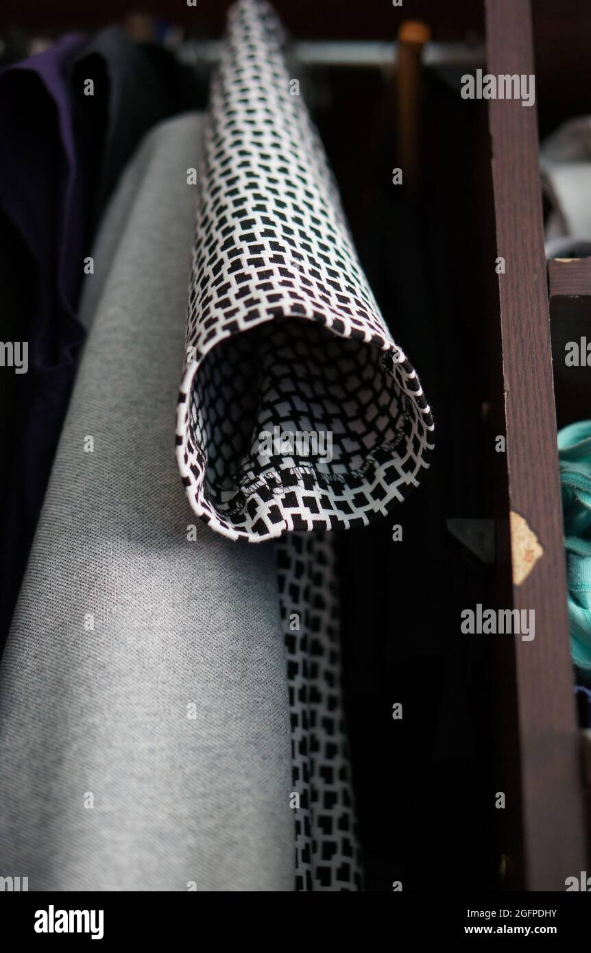 Piece of black and white clothes on the closet Stock Photo - Alamy