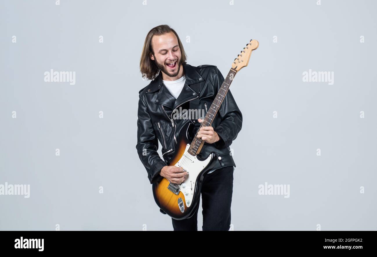 man long hair play electric guitar. rock music style. musician guitar player  Stock Photo - Alamy
