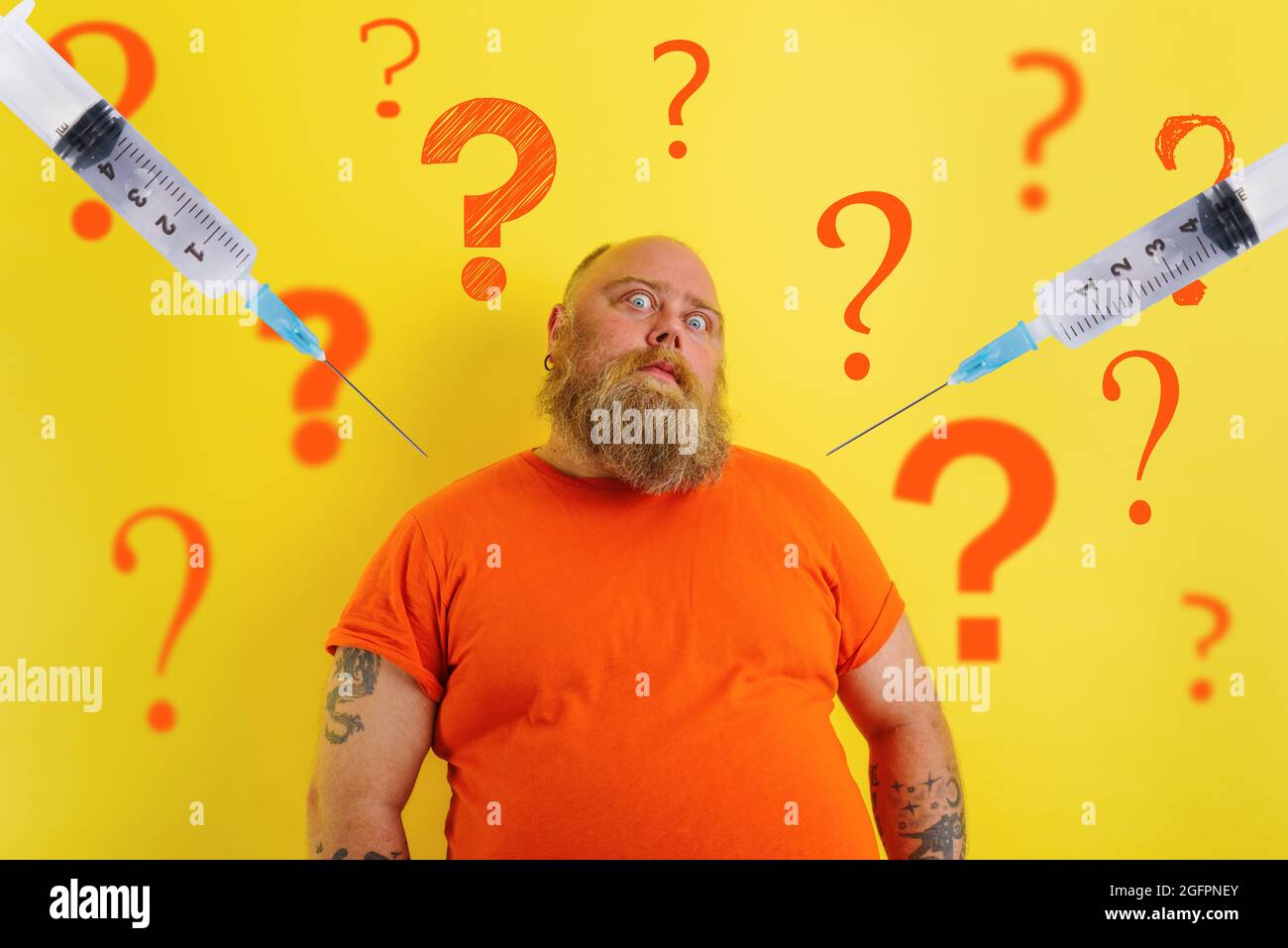 Fat doubter man has doubts about covid-19 vaccine Stock Photo