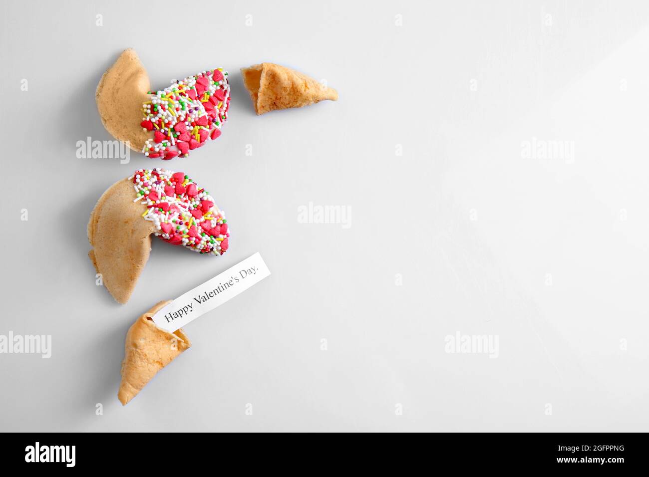 Fortune cookies on white background Stock Photo - Alamy