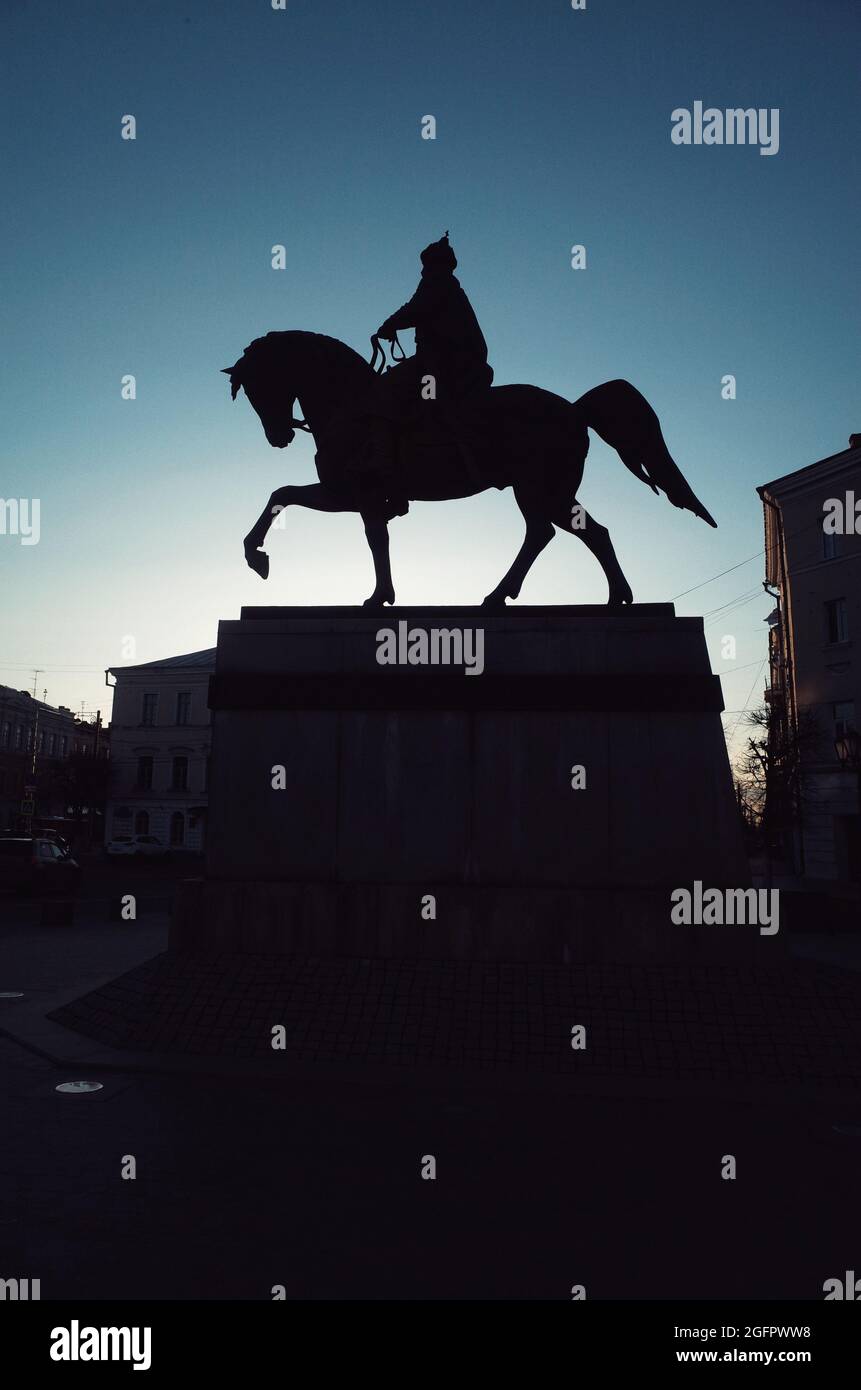 Statue of Yuriy Dolgorukiy in Tver, Russia, Tverskaya Square, Soviet squeare, sunset, evening, contrast lightning Stock Photo