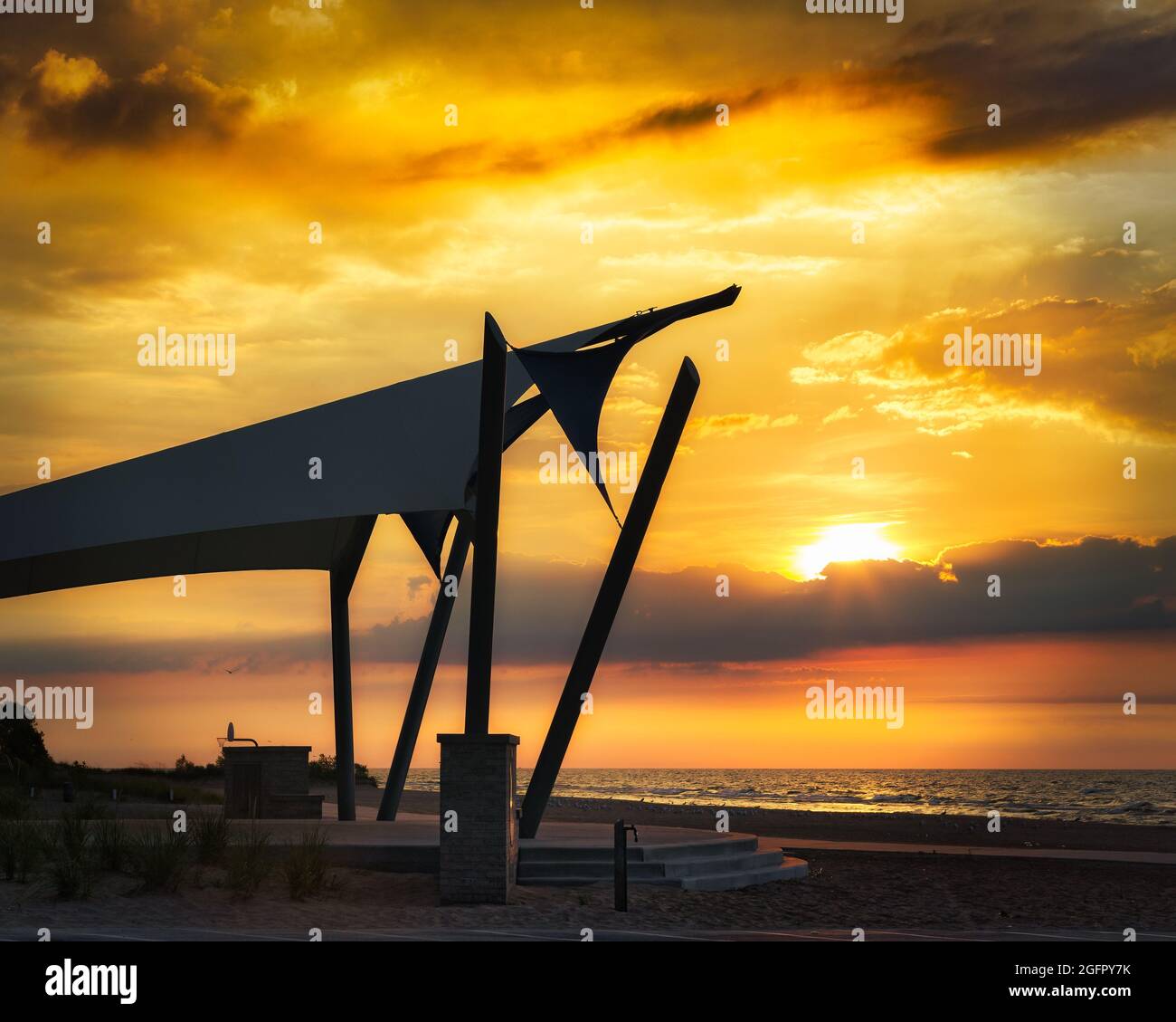 Sunrise at the beach stage on Neshotah Park in Two Rivers Stock Photo