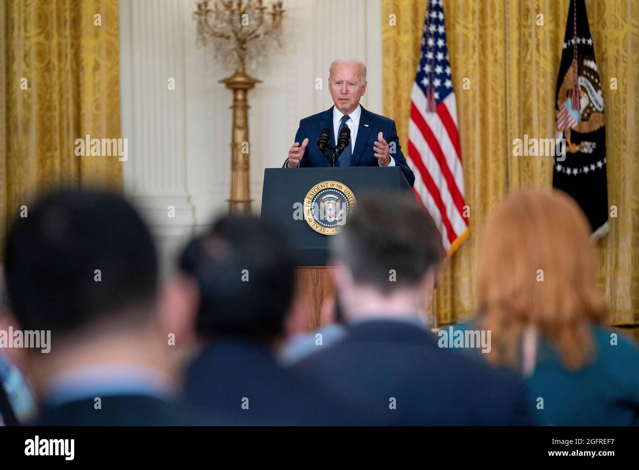 United States President Joe Biden delivers remarks in the East Room of the White House in Washington, DC on Thursday, August 26, 2021. Multiple explosions near Hamid Karzai International Airport in Kabul, Afghanistan wounded many and killed at least 12 American service members. Credit: Stefani Reynolds/Pool via CNP Stock Photo