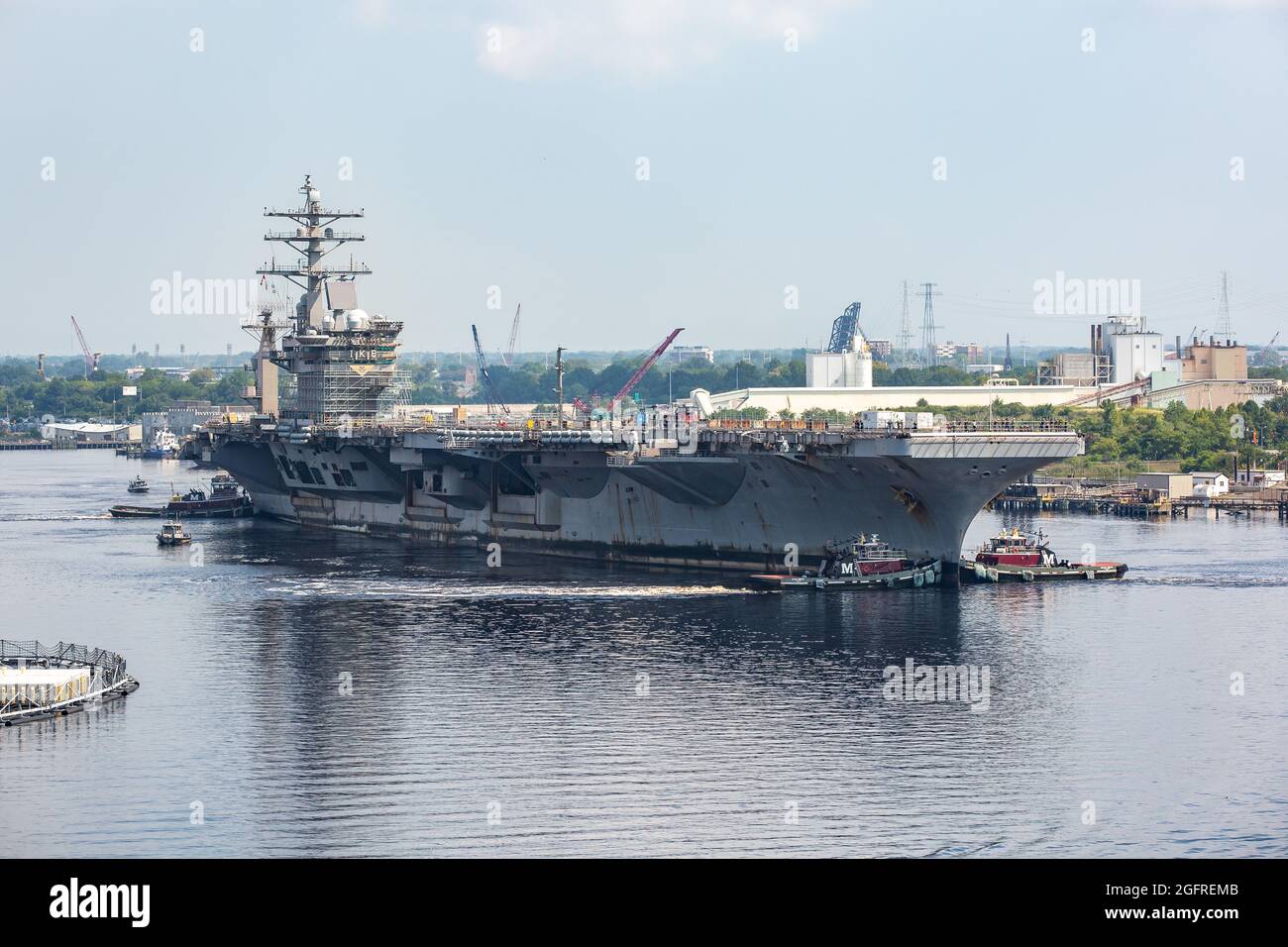 Norfolk Naval Shipyard (NNSY) welcomed USS Dwight D. Eisenhower (CVN 69) Aug. 25 in advance of its 13-month Planned Incremental Availability (PIA). Stock Photo