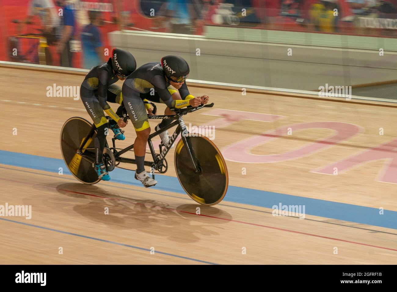 Tokyo, Japan. 26th Aug, 2021. Nur Azlia Syafinaz Mohd Zais and pilot Nurul Suhada Zainal of Malaysia run cycling track for women 1000m time trial at Izu Velodrome during Tokyo 2020 Paralympic Games. Because of COVID-19 pandemic games were postponed by a year and there were no spectators allowed into venues. (Photo by Lev Radin/Pacific Press) Credit: Pacific Press Media Production Corp./Alamy Live News Stock Photo