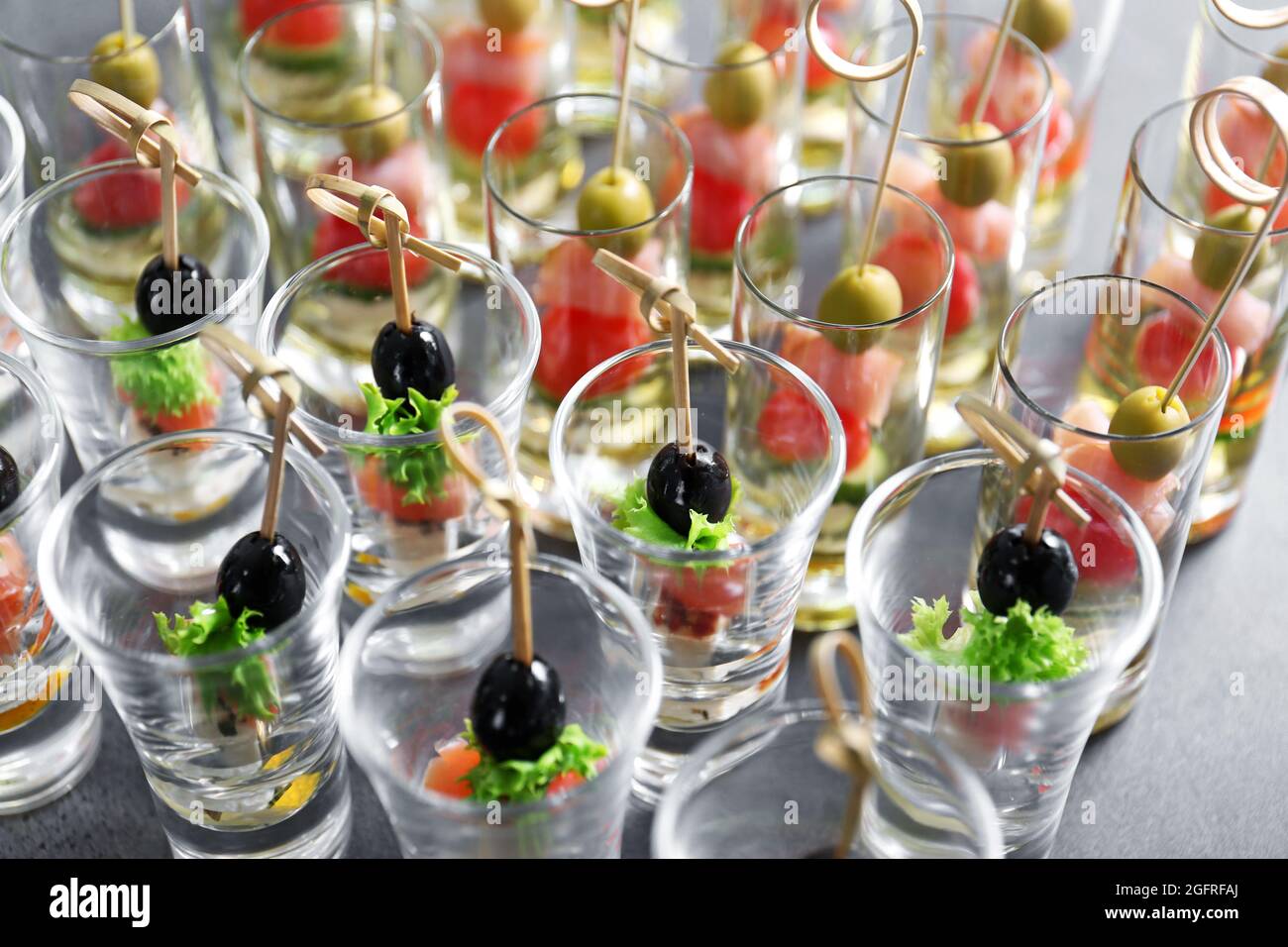 Fresh tasty canapes in glass cups, closeup Stock Photo Alamy