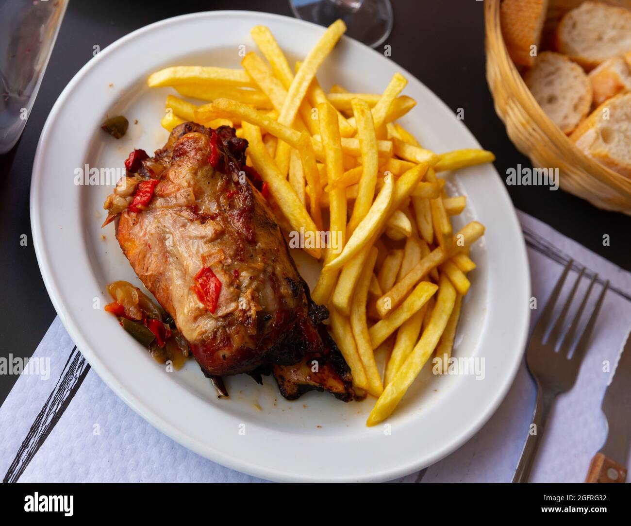 Pork knuckle with french fries Stock Photo Alamy