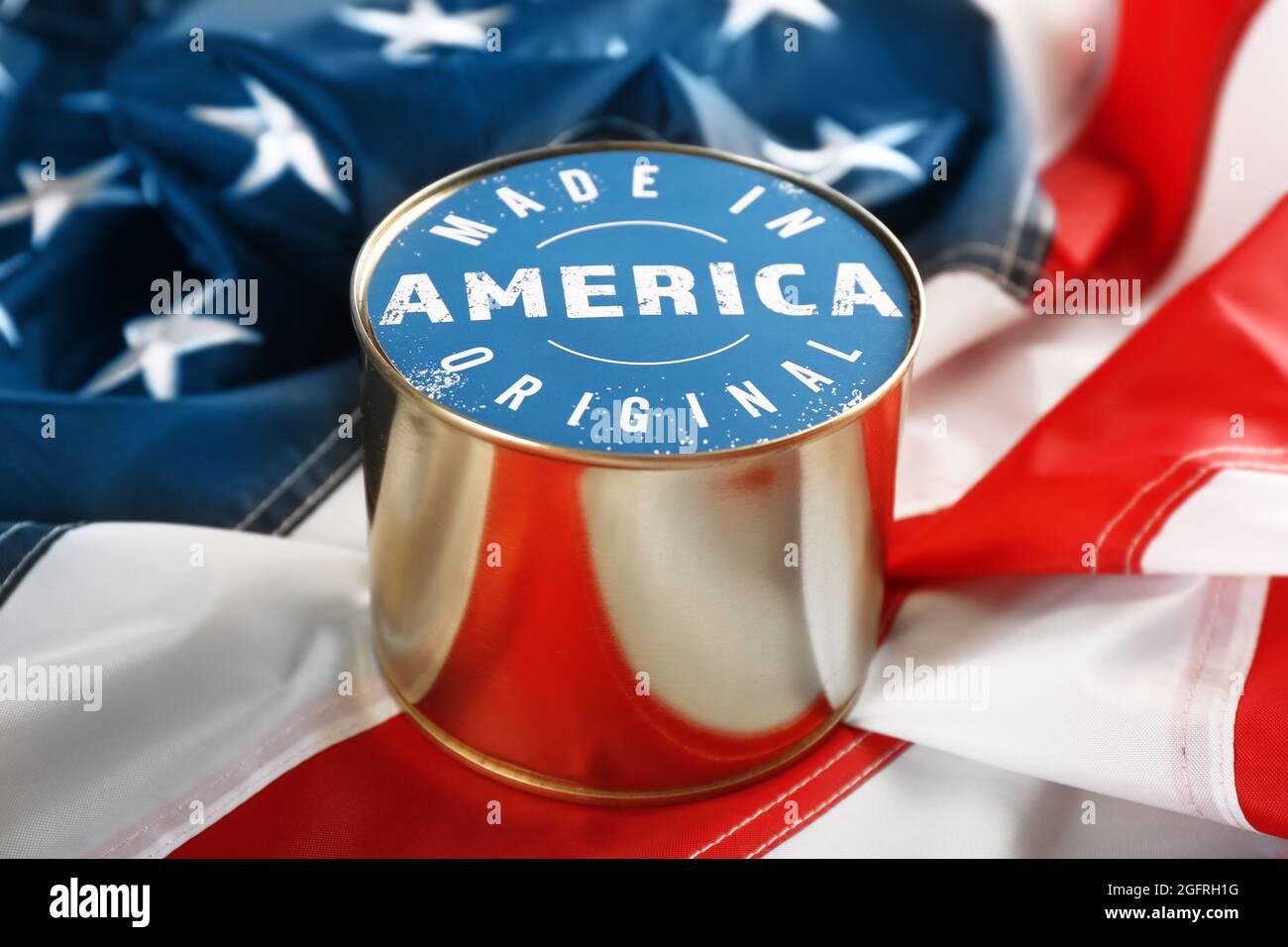 Canned food on American flag. Made in America Stock Photo Alamy