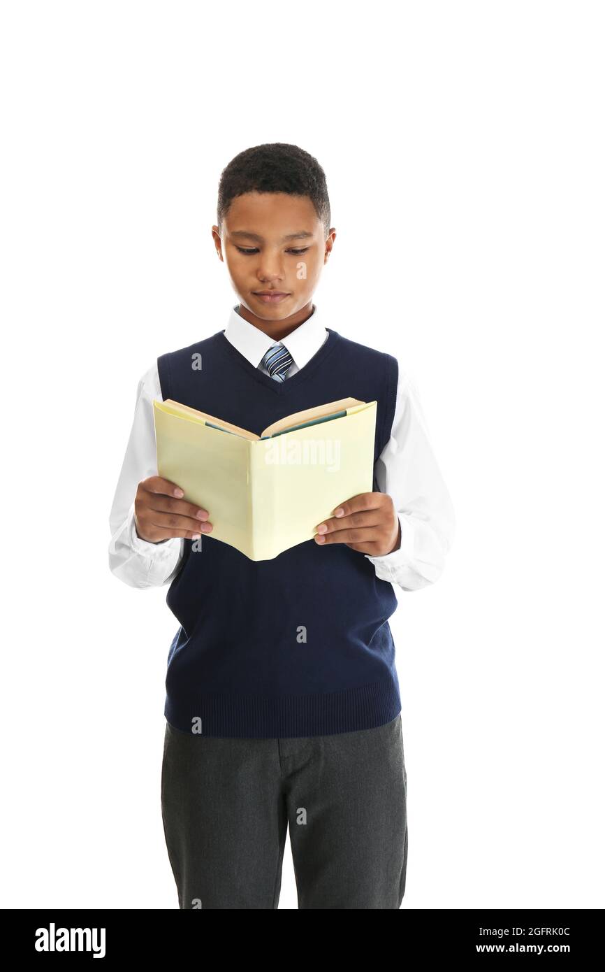 Cute teenager with book on white background Stock Photo - Alamy