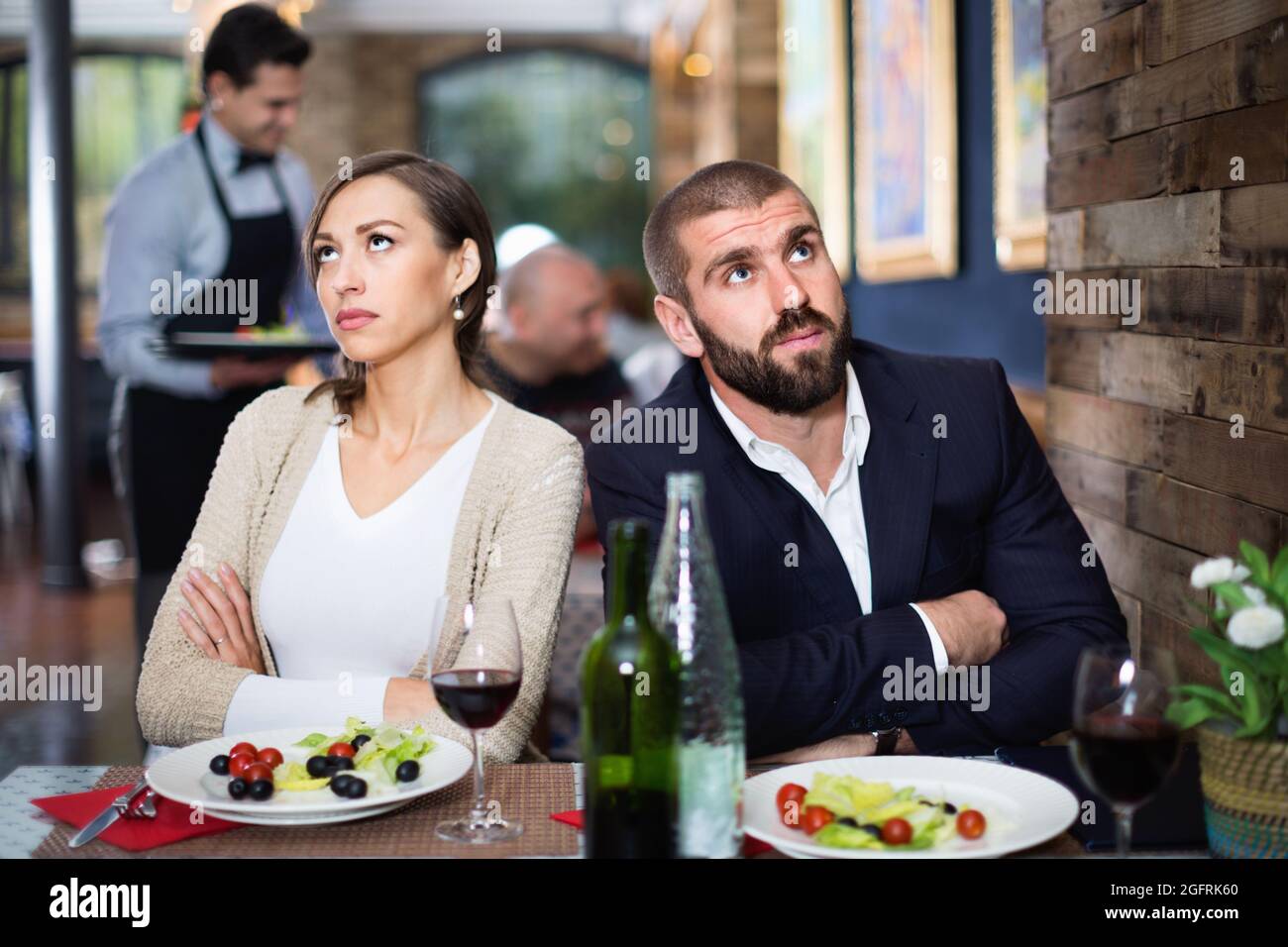 Man woman dinner table sad hi-res stock photography and images - Alamy