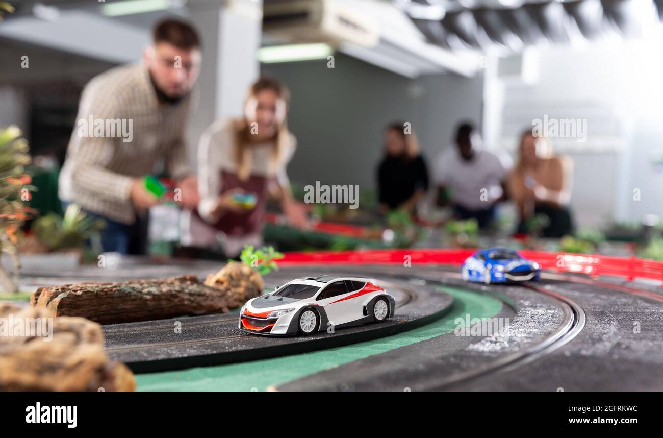 Models of race cars on track Stock Photo - Alamy