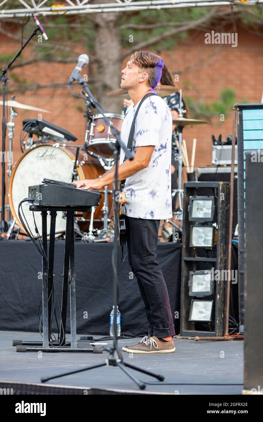 Jeff Edgel, piano player for the rock band Attaboy, plays during an outdoor concert in Angola, Indiana, USA. Stock Photo