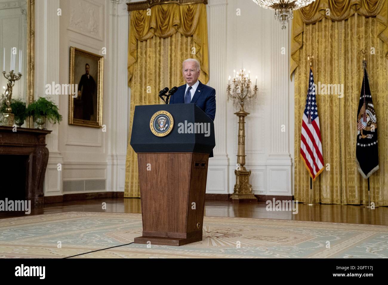 United States President Joe Biden delivers remarks in the East Room of the White House in Washington, DC, USA on Thursday, August 26, 2021. Multiple explosions near Hamid Karzai International Airport in Kabul, Afghanistan wounded many and killed at least 12 American service members. Credit: Stefani Reynolds / Pool via CNP Stock Photo