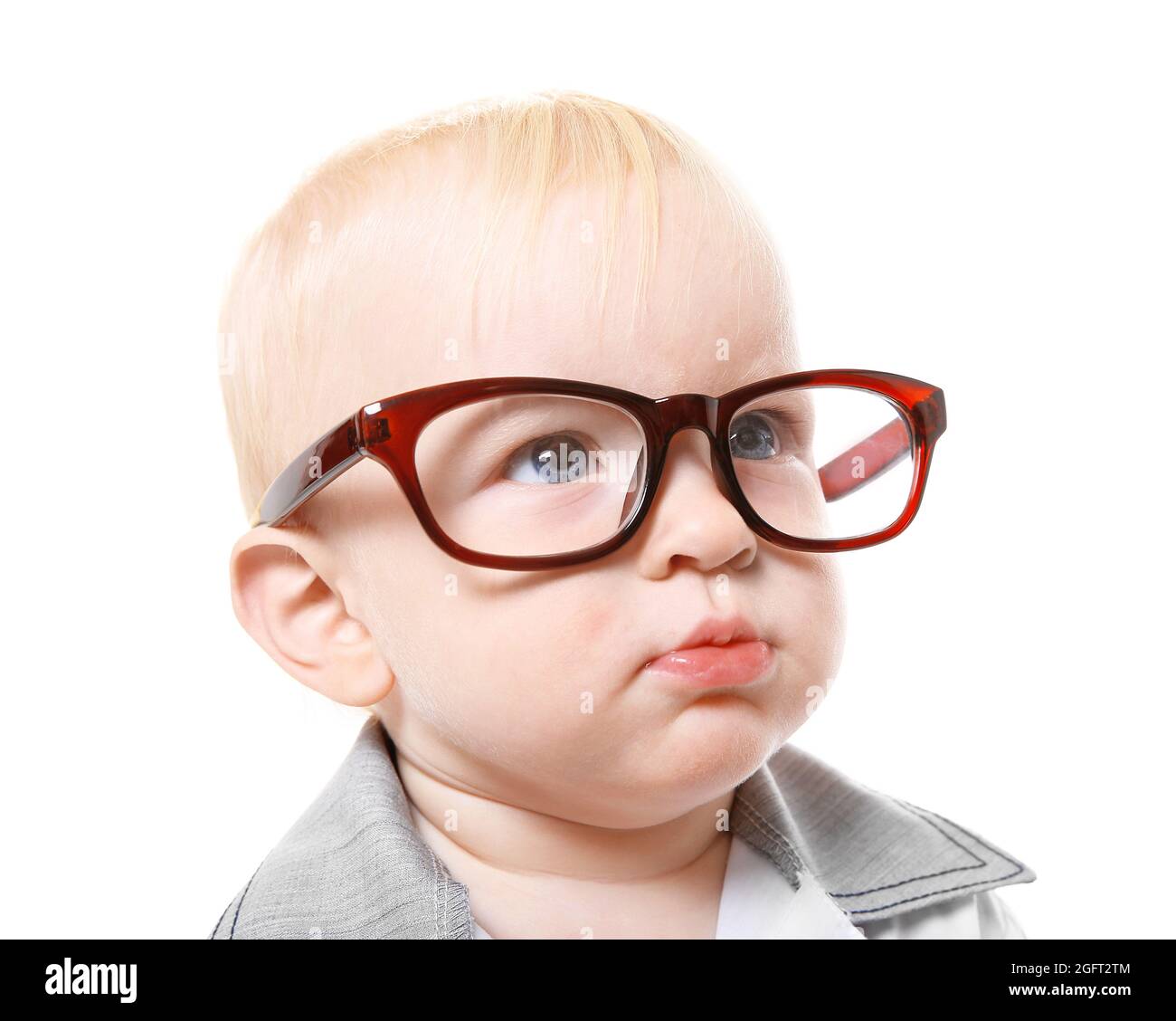 Cute baby boy wearing glasses on white background Stock Photo - Alamy