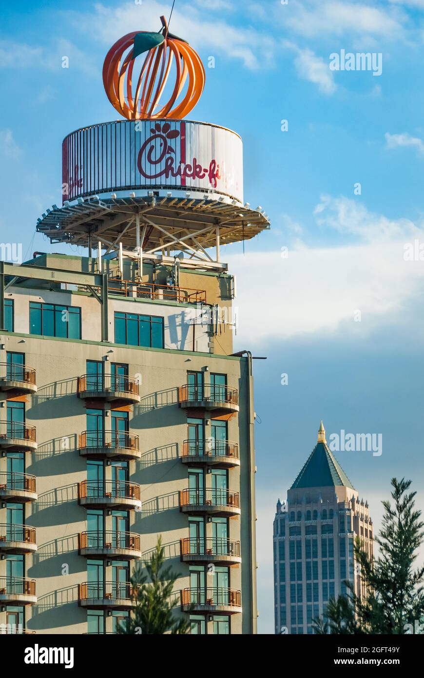 https://c8.alamy.com/comp/2GFT49Y/peach-sculpture-and-round-rotating-chick-fil-a-billboard-along-peachtree-street-and-i-85-in-midtown-atlanta-georgia-near-buckhead-usa-2GFT49Y.jpg
