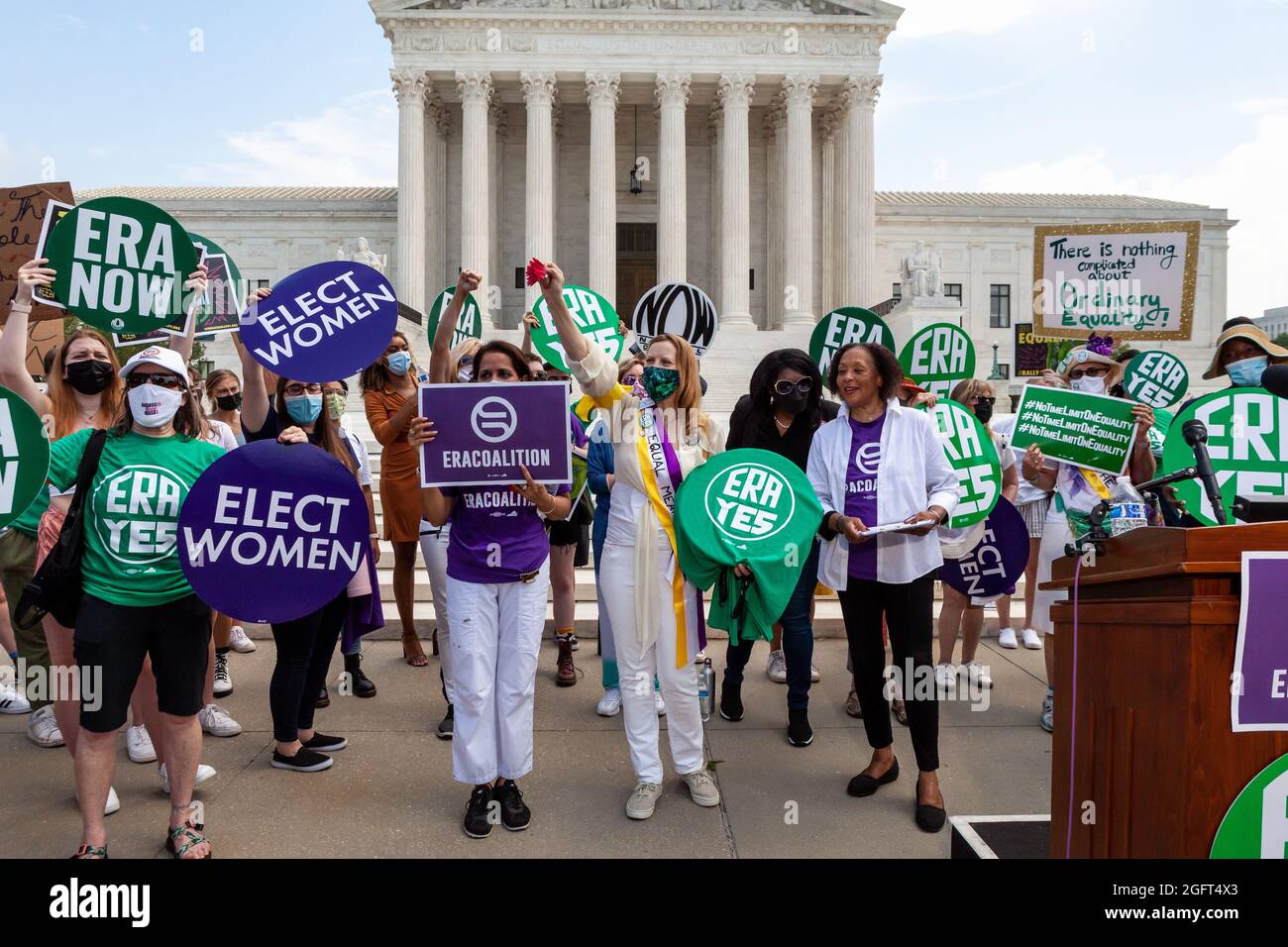 Washington, DC, USA, 26 August, 2021.  Pictured: Demonstrators at a rally to pass the Equal Rights Amendment (ERA) at the Supreme Court cheer following the conclusion of the event.  The amendment would prohibit discrimination on the basis of sex, which would require equal pay for women, among many other changes.  The required 38 states have ratified the amendment, but, unlike other constitutional amendments, a time limit was placed on the ERA, which has now expired.  ERA proponents are pressuring Congress to extend the time limit.  Credit: Allison Bailey / Alamy Live News Stock Photo