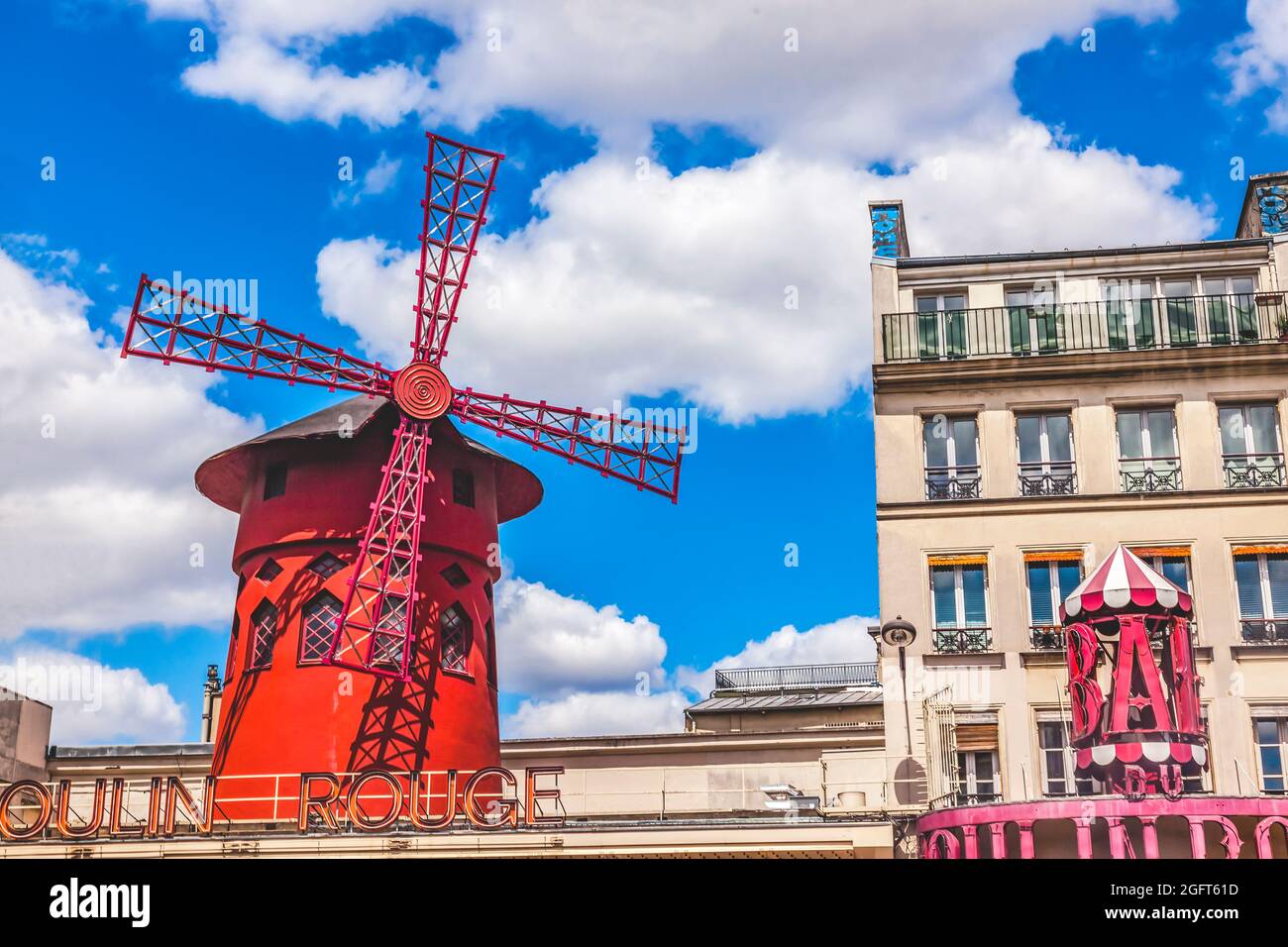 Famous Red Windmill Moulin Rouge Nightclub Cabaret Paris France.  Opened 1915 where Can Can dance was first shown. Stock Photo