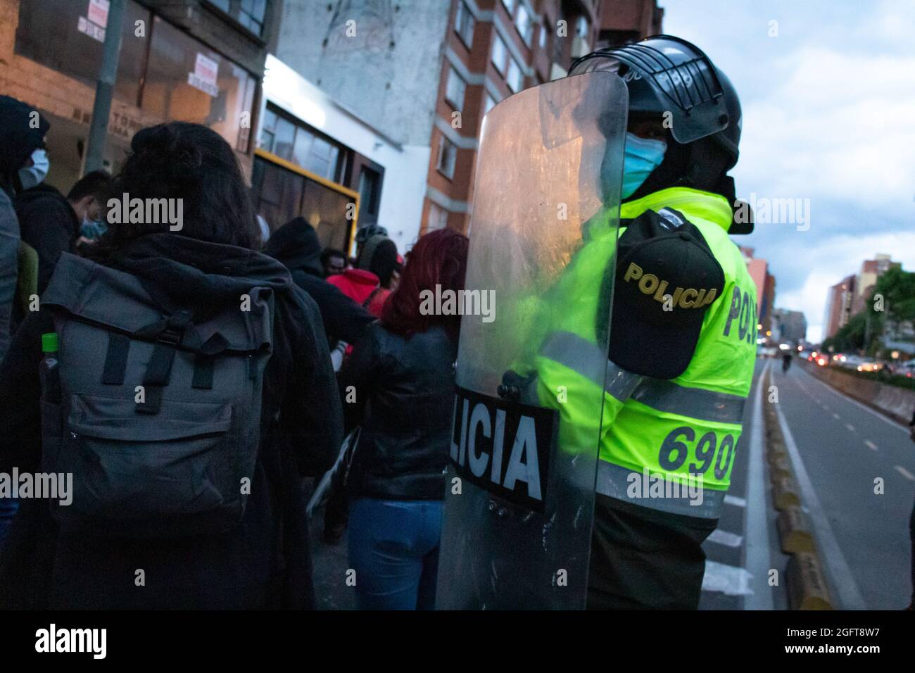 A riot police officer during a rally organized by students of the Universidad Distrital, after a few days back Esteban Mosquera, a social leader and community member was killed two years after loosing his eye on a police brutality case, in Bogota, Colombia on August 26, 2021. Stock Photo