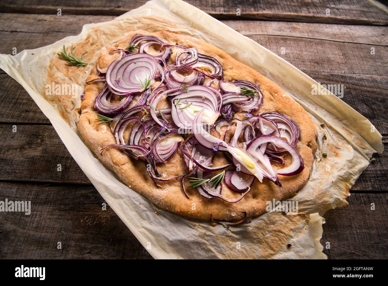 Focaccia made with whole wheat flour with red onion Stock Photo Alamy