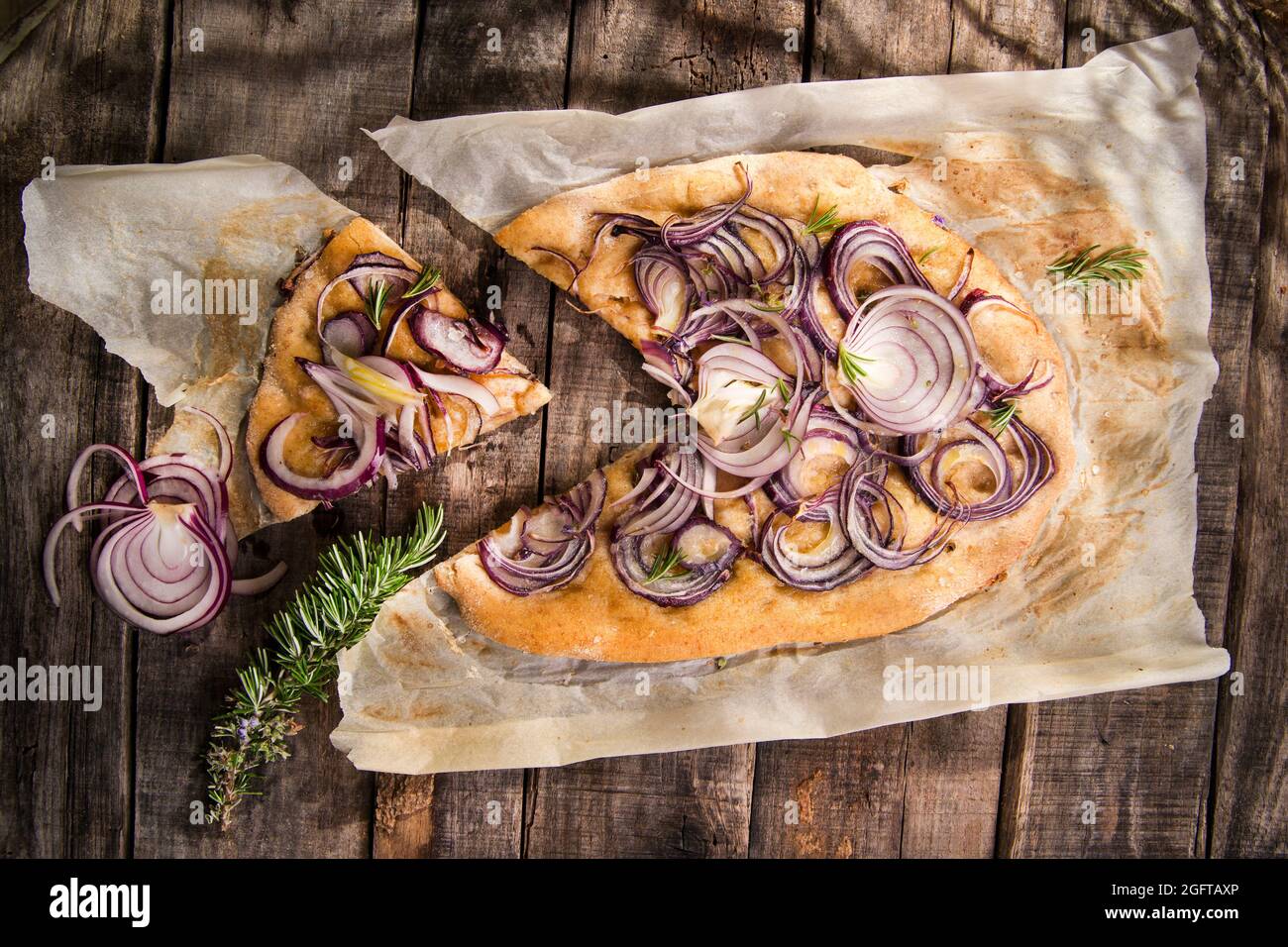 Focaccia made with whole wheat flour with red onion Stock Photo Alamy