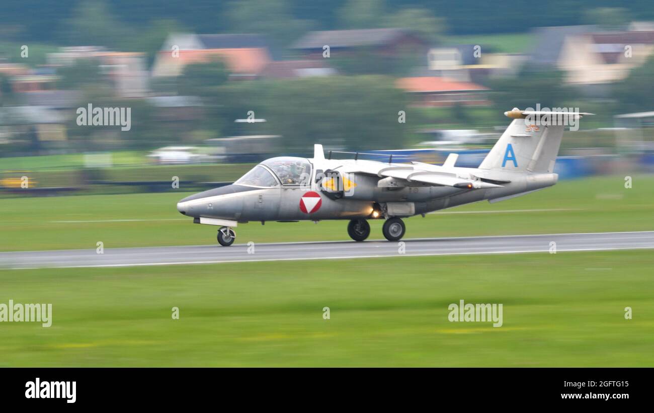 Zeltweg, Austria SEPTEMBER, 6, 2019 Historic training military jet landing. Panning picture with copy space. SAAB 105 of Austrian Air Force Stock Photo