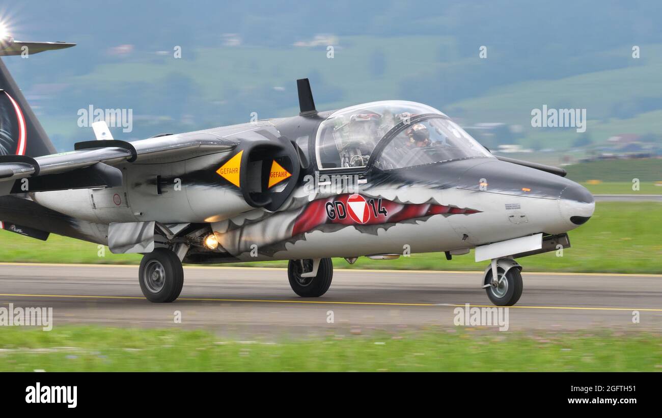 Zeltweg, Austria SEPTEMBER, 6, 2019 Twin seats training military jet plane with special livery taxiing on the runway. SAAB 105 of Austrian Air Force Stock Photo